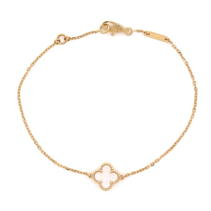 Van Cleef Arpels Sweet Alhambra Bracelet 18K Yellow Gold and Mother of Pearl: Condition Preowned GoodBrand Van Cleef ArpelsMain Stone UnknownMetal 18K Yellow GoldMetal Purity 18KStyle BraceletType BraceletColor Yellow GoldMaterial 18K Yellow Gold Mother Of Pearl 
