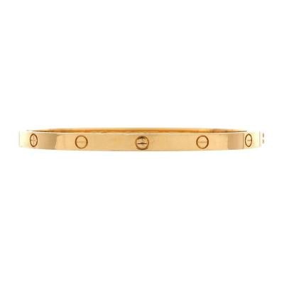 Cartier Love Bracelet 18K Yellow Gold Small: Measurements: Circumference: 5.40 ", Width: 3.60 mm . Condition: Pre-owned - Good,Brand: Cartier,Main Stone: Unknown,Metal: 18K Yellow Gold,Metal Purity: 18K,Style: Bracelet,Type: Bracelet,Color: