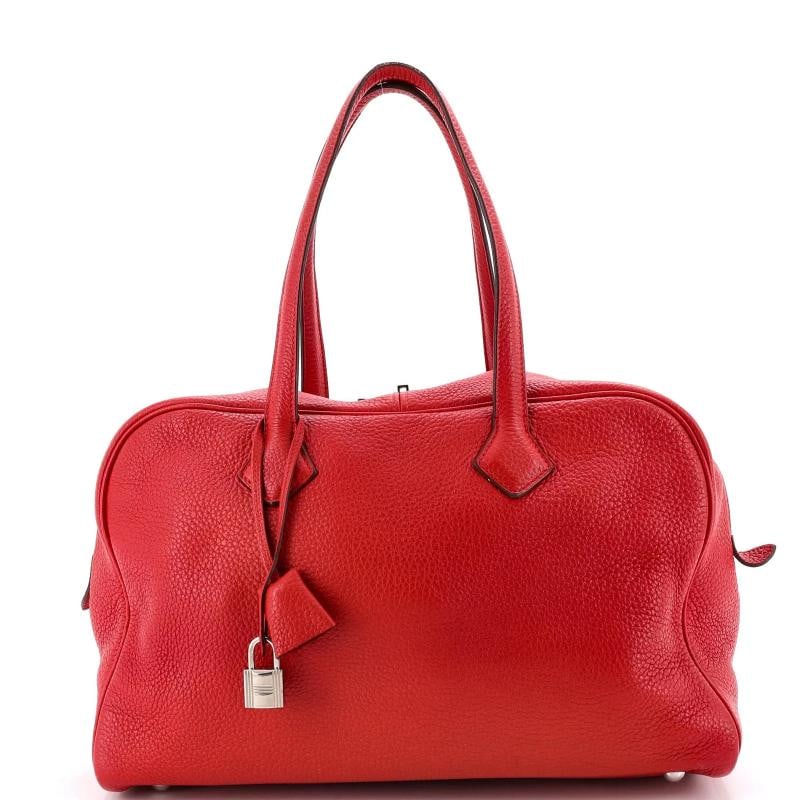 Hermes Victoria II Bag Clemence 35: Condition: Pre-owned - Fair,Brand: Hermes,Exterior Material: Leather,Style: Satchels,Exterior Color: Red,Department: Women,Size: 35,Accessories: Keys, Clochette, Lock Estimated Retail Price: $5,150
