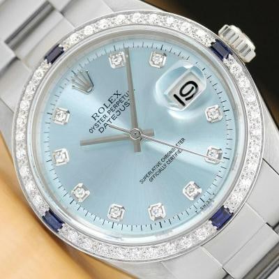 MENS ROLEX DATEJUST ICE BLUE 18K WHITE GOLD DIAMOND SAPPHIRE & STEEL WATCH: This is an authentic Rolex Datejust 1603 watch with Rolex dial Ref. with added diamond hour markers, custom 18K white gold sapphire diamond bezel, and custom stainless steel oyster bracelet. Descripti