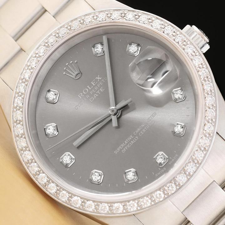 ROLEX MENS OYSTER PERPETUAL DATE 34MM 15200 GRAY DIAL DIAMOND STEEL WATCH: This is an authentic Rolex oyster perpetual date 15200 34 mm watch with Rolex stainless steel oyster bracelet, Rolex dial Ref. with added diamond markers, and custom 18K white gold diamond