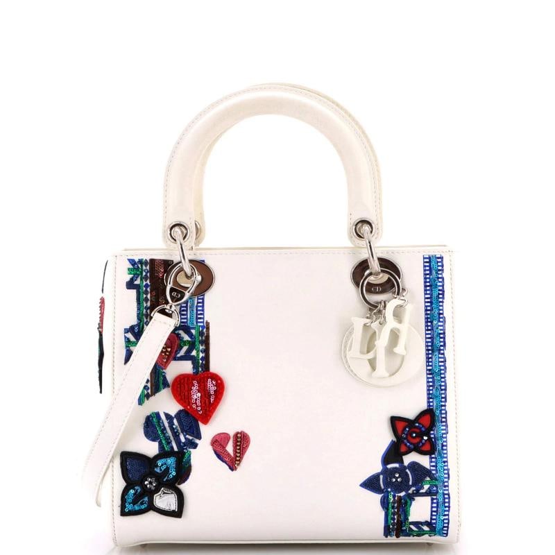 Christian Dior Lady Dior Bag Patch Embellished Leather Medium: Accessories: Dust Bag, With Strap Measurements: Height 8", Width 9", Depth 4". Condition: Pre-owned - Good,Brand: Christian Dior,Exterior Material: Beaded, Leather,Style: Top Handle,Exterior Color: