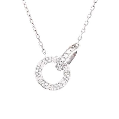 Cartier Love Interlocking Pave Necklace 18K White Gold and Diamonds: Measurements: Length: 14.75 - 16.0 ", Pendant Length: 0.75 ", Pendant Width: 2.65 mm . Condition: Pre-owned - Good,Brand: Cartier,Main Stone: Diamond,Metal: 18K White Gold,Metal Purity: 18K,Style: