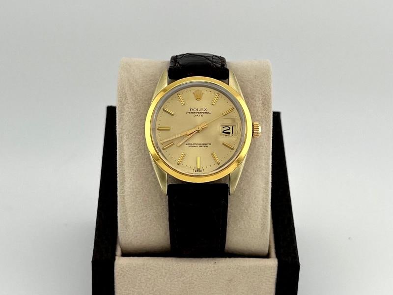 Rolex Oyster Perpetual Date 1550 34mm Champagne Dial 14k Gold Stainless Steel: Condition: Pre-owned - Excellent,Country of Origin: Switzerland,Bezel Color: Gold, Yellow,Movement: Mechanical (Automatic),Seller Warranty: Yes,Year Manufactured: 1970-1979,Vintage: Yes,Band/Strap: