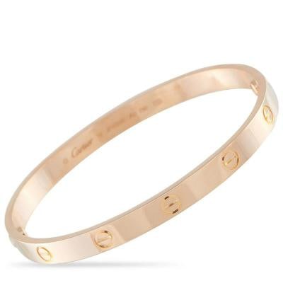 Cartier LOVE 18K Rose Gold Bracelet: This Size 19 bracelet measures 7.50 long. Condition: Pre-owned - Good: This item has been gently used but is in good condition. It might have a few signs of wear, like light scratches or tarnishing.