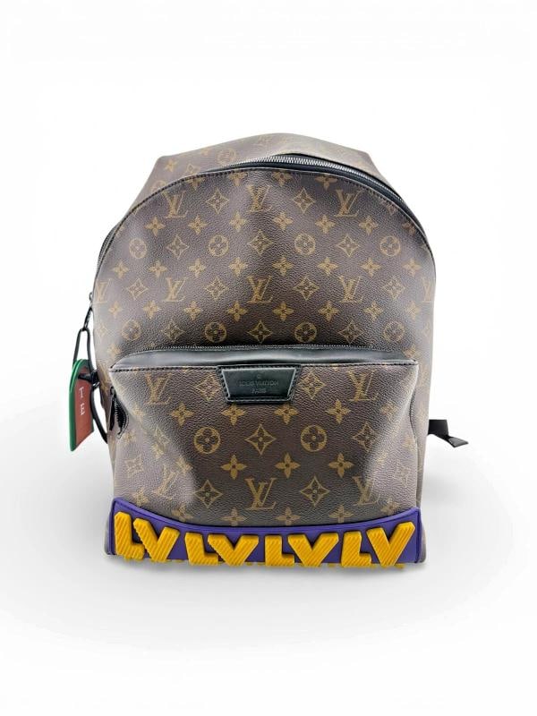 LOUIS VUITTON Monogram LV Rubber Discovery Backpack in Monogram Canvas & Leather: Condition: Pre-owned - Excellent,Bag Width: 6.5,Pattern: Monogram,Closure: Zip,Bag Height: 16 in,Handle Style: Top Handle,Color: Multicolor,Bag Depth: 7.75,Year Manufactured: 2020-2029,Material: