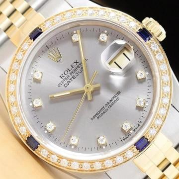 ROLEX DATEJUST 16233 GRAY FACTORY DIAMOND SAPPHIRE 18K YELLOW GOLD STEEL WATCH: This is an authentic Rolex Datejust 16233 watch with a two tone 18K yellow gold and stainless steel jubilee bracelet, factory Rolex diamond dial Ref., and custom 18K yellow gold diamond and sapphire b