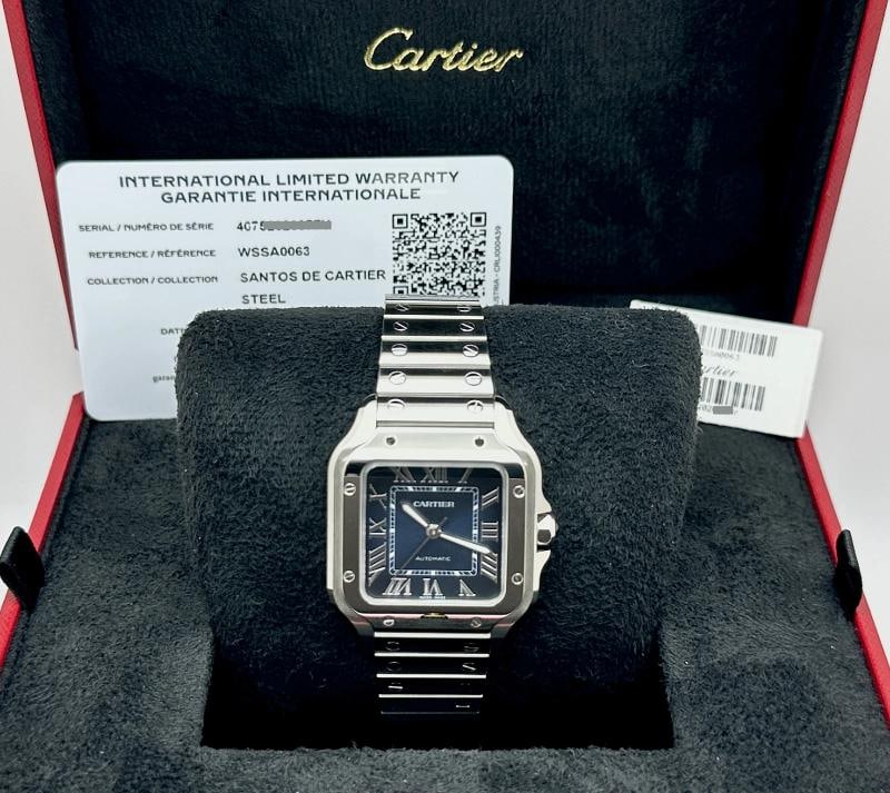 Cartier Santos Medium 35.1mm WSSA0063 Blue Dial Steel Extra Band Box Paper: Condition: Pre-owned - Excellent,Bezel Color: Silver,Indices: Roman Numerals,Year Manufactured: 2020-Now,Band/Strap: Bracelet,Case Color: Silver,Department: Unisex Adults,Watch Shape: Square,Style: