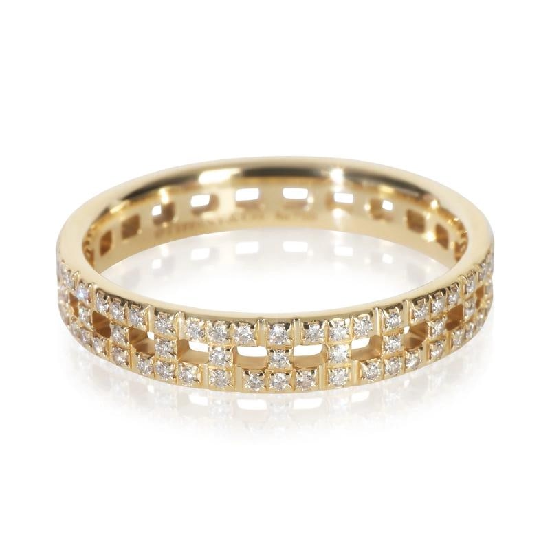 Tiffany & Co. Yellow Gold Tiffany T True Narrow Ring: Condition: Pre-owned - Good,Country of Origin: Italy,With Original Box/Packaging: Yes,Side Stone Type: No Stone,Metal Purity: 18k,With Papers: No,Gross Weight (grams): 2.97,Department:
