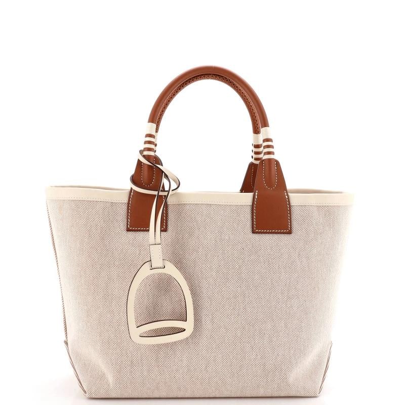 Hermes Sac Steeple Tote Toile with Leather 25: Condition: Pre-owned - Excellent,Brand: Hermes,Exterior Material: Canvas Plain,Style: Totes,Exterior Color: Neutral,Department: Women,Size: 25,Accessories: Dust Bag, Charms Estimated Retail Price: