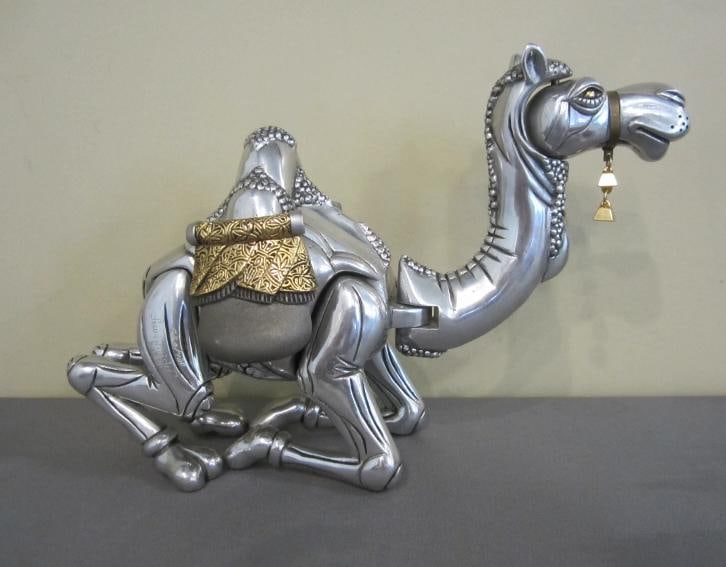 Frank Meisler Signed Sculpture~Edition Of /730: Metal alloys with silver and gold plated elements. Measures about 12 1/2" long with her neck and head fully straight. Sits about 8 1/4" tall at the tips of her ears. She weighs in at 5 lbs. 11 ounce.