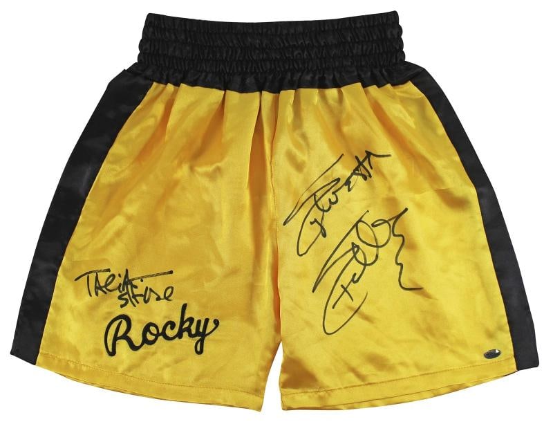Sylvester Stallone & Talia Shire Signed Yellow Rocky Boxing Trunks BAS: Industry: Movies,Original/Reproduction: Original,Autograph Authentication: Beckett,PRODUCT_COA: Beckett,PRODUCT_SIGNED_BY_NAME: Sylvester Stallone & Talia Shire,PRODUCT_SIGNED_BY_BRAND: Rocky,Country