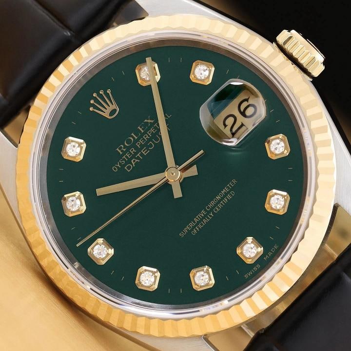 ROLEX MENS DATEJUST 16233 GREEN DIAMOND 18K GOLD STEEL BLACK LEATHER BAND WATCH: This is an authentic Rolex Datejust 16233 watch with Rolex dial Ref. with added diamond markers, Rolex 18K yellow gold fluted bezel, and custom genuine black leather strap.Descriptions: Brand: Rolex M