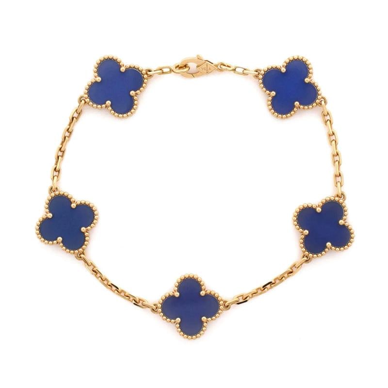 Van Cleef & Arpels Vintage Alhambra 5 Motifs Bracelet 18K Yellow Gold and Agate: Condition: Pre-owned - Good,Brand: Van Cleef & Arpels,Main Stone: Agate,Metal: 18K Yellow Gold,Metal Purity: 18K,Style: Bracelet,Type: Bracelet,Color: Yellow Gold,Material: 18K Yellow Gold, Agate Cond