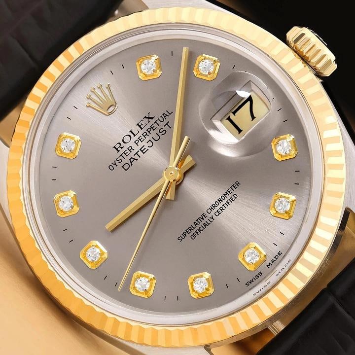 ROLEX MENS DATEJUST 16013 18K GOLD STEEL GRAY DIAMOND WATCH w/ LEATHER BAND: This is an authentic Rolex Datejust 16013 watch with Rolex dial Ref. with added diamond markers, Rolex 18K yellow gold fluted bezel, and custom genuine black leather strap.Descriptions: Brand: Rolex