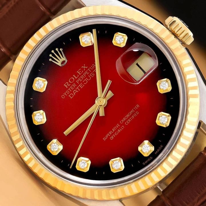 ROLEX DATEJUST 16013 18K GOLD STEEL RED VIGNETTE DIAMOND WATCH w/ LEATHER BAND: This is an authentic Rolex Datejust 16013 watch with Rolex dial Ref. with added diamond markers, Rolex 18K yellow gold fluted bezel, and custom genuine brown leather strap. Descriptions: Brand: