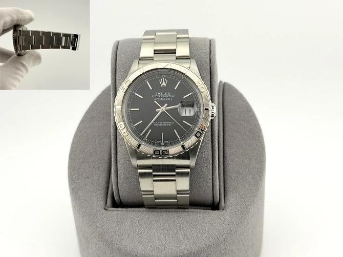Rolex Datejust Turn O Graph Thunderbird 16264 36mm Black Dial 18k Gold Steel: Style Number: 16264 Serial: K88**** Year: 2001 Model: Rolex Datejust Turn-O-Graph "Thunderbird" Case Material: Stainless Steel Band: Stainless Steel Bezel: 18k White Gold Dial: Black Dial Crystal: Sap