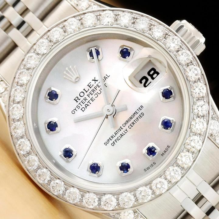 ROLEX DATEJUST 69174 MOTHER OF PEARL SAPPHIRE 1.1 CT DIAMOND 18K GOLD SS WATCH: This is an authentic Rolex Datejust 69174 watch with Rolex stainless steel jubilee bracelet, Rolex dial Ref. with added mother of pearl and sapphire markers, custom 18K white gold 1.1 CT diamond bezel