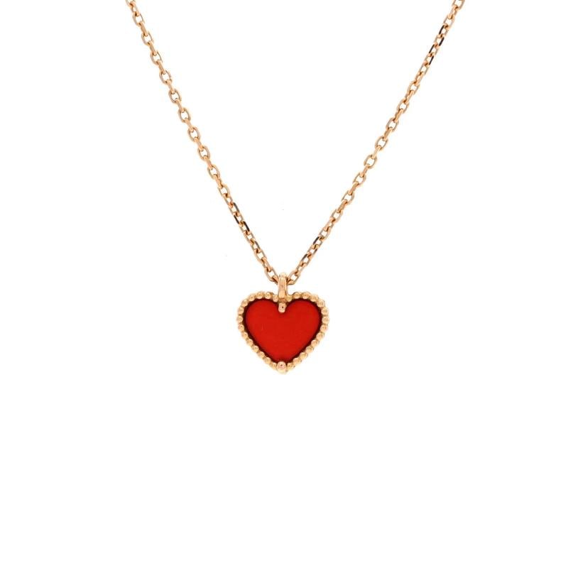 Van Cleef & Arpels Sweet Alhambra Heart Pendant Necklace 18K Rose Gold: Measurements: Length: 15.0 - 15.75 ", Pendant Length: 9.85 mm, Pendant Width: 8.90 mm . Condition: Pre-owned - Good,Brand: Van Cleef & Arpels,Main Stone: Carnelian,Metal: 18K Rose Gold,Metal Purity: