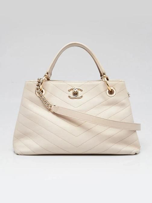 Chanel Beige Chevron Quilted Leather Small Chevron Chic Shopping Bag: Handle Drop: 3.5" and 18"-adjustable Measurements: 12" L x 6.5" W x 7" H. Condition: Pre-owned - Good,Brand: Chanel,Exterior Material: Leather,Style: Crossbody Bags,Everyday Bags,Exterior Color: