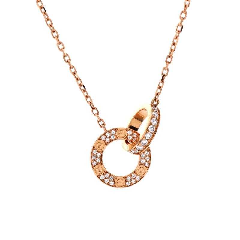 Cartier Love Interlocking Pave Necklace 18K Rose Gold and Diamonds: Measurements: Length: 14.75 - 16.0 ", Pendant Length: 0.75 ", Pendant Width: 2.60 mm . Condition: Pre-owned - Good,Brand: Cartier,Main Stone: Diamond,Metal: 18K Rose Gold,Metal Purity: 18K,Style: Neck