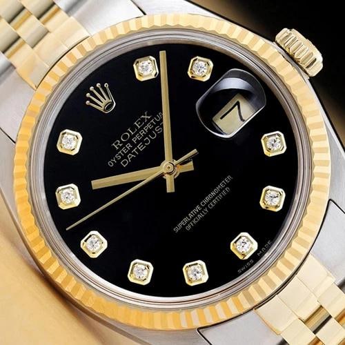 ROLEX DATEJUST 16233 18K GOLD STEEL TWO TONE BLACK FACTORY DIAMOND DIAL WATCH: This is an authentic Rolex Datejust 16233 watch with Rolex two tone 18K yellow gold and stainless steel jubilee bracelet, factory Rolex diamond dial Ref., and Rolex 18K yellow gold fluted bezel.