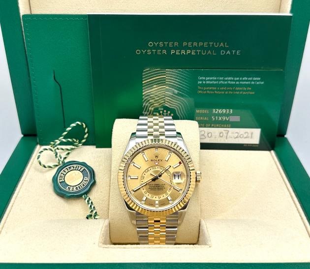 Rolex Sky Dweller 326933 42mm Champagne Dial 18K Yellow Gold Steel Box Paper: Serial: 51X9V*** Year: 2021 Model: Rolex Sky-Dweller Case Material: Stainless Steel Band: 18K Yellow Gold & Stainless Steel Bezel: 18K Yellow Gold Dial: Champagne Crystal: Sapphire Crystal Case Size: