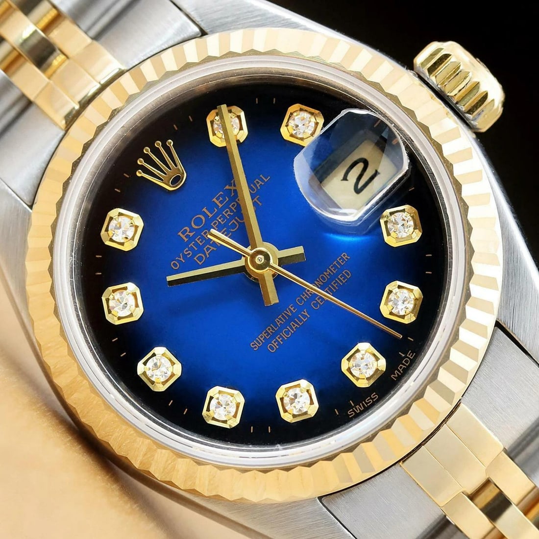 ROLEX LADIES DATEJUST BLUE VIGNETTE DIAMOND TWO TONE 18K YELLOW GOLD 69173 WATCH: Condition: Pre-owned - Good,Bezel Color: Gold,Max Wrist Size: 6.26-6.75 in,Number of Jewels: 29 Jewels,Indices: Diamond Markers, 12-Hour Dial,Band: Rolex Two Tone Jubilee Bracelet,Bezel: Rolex 18K
