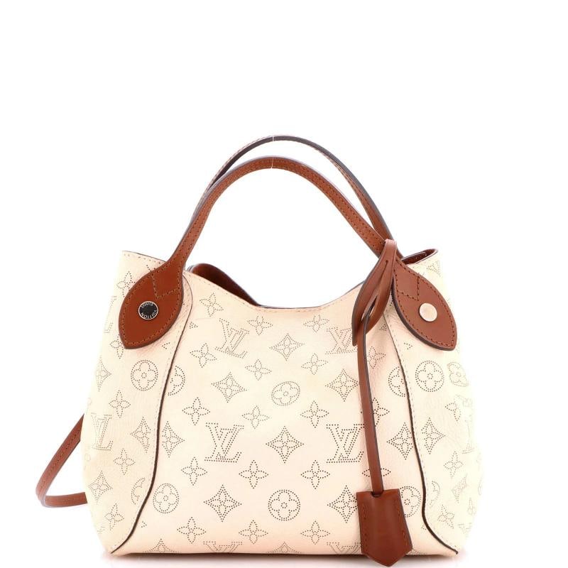 Louis Vuitton Hina Handbag Mahina Leather PM: Accessories: Pochette, Clochette, With Strap Measurements: Handle Drop 4.5", Height 8.5", Width 9", Depth 5", Strap Drop 25". Condition: Pre-owned - Good,Brand: Louis Vuitton,Exterior Material: