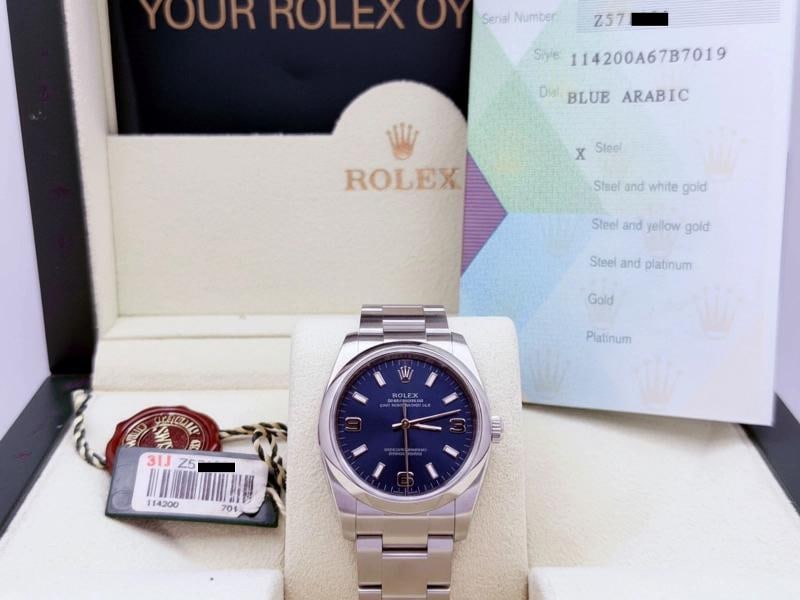 Rolex Oyster Perpetual Air King 114200 34mm Blue Dial Stainless Steel Box Papers: Style Number: 114200 Serial: Z57**** Year: 2008 Model: Rolex Air King Case Material: Stainless Steel Band: Stainless Steel Bezel: Stainless Steel Dial: Blue Arabic Numeral Dial 