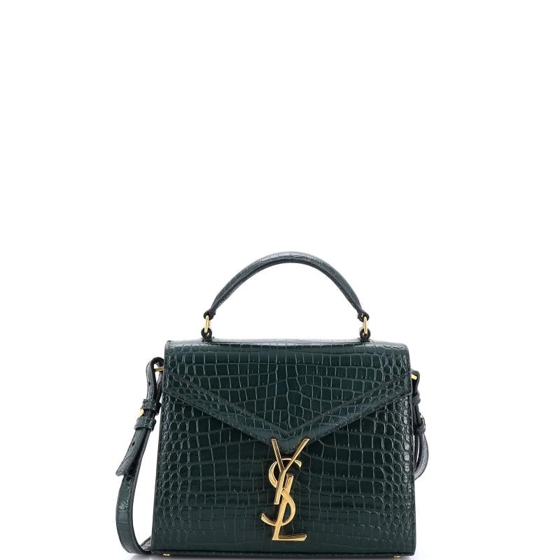 Saint Laurent Cassandra Top Handle Bag Crocodile Embossed Leather Mini: Accessories: With Strap Measurements: Handle Drop 2.5", Height 6.5", Width 8", Depth 3", Strap Drop 20" . Condition: Pre-owned - Good,Brand: Saint Laurent,Exterior Material: Leather,Style: Shoulder