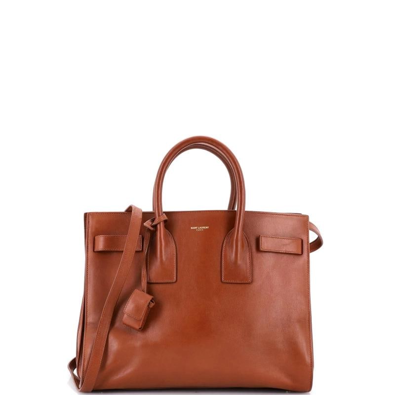 Saint Laurent Sac de Jour Bag Leather Small: Condition: Pre-owned - Good,Brand: Saint Laurent,Exterior Material: Leather,Style: Top Handle,Exterior Color: Brown,Department: Women,Size: Small,Accessories: Keys, Clochette, Lock, With Strap 