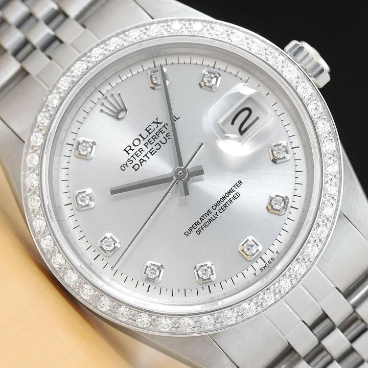 MENS ROLEX DATEJUST 1603 18K WHITE GOLD STEEL SILVER DIAMOND DIAL JUBILEE WATCH: This is an authentic Rolex Datejust 1603 watch with Rolex dial Ref. with added genuine diamond markers, custom 18K white gold diamond bezel, and custom stainless steel jubilee bracelet. Descriptions: