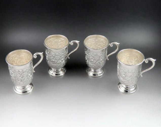 4 Antique c1930 Indonesian Hand Chased Repousse Punch Coffee Tea Cups Mugs: The underside of each cup is marked sterling silver. This set is in excellent condition and the designs are very crisp. There are no damages and no repairs. Diameter: 2 1/2 inches. Height: 3 3/4