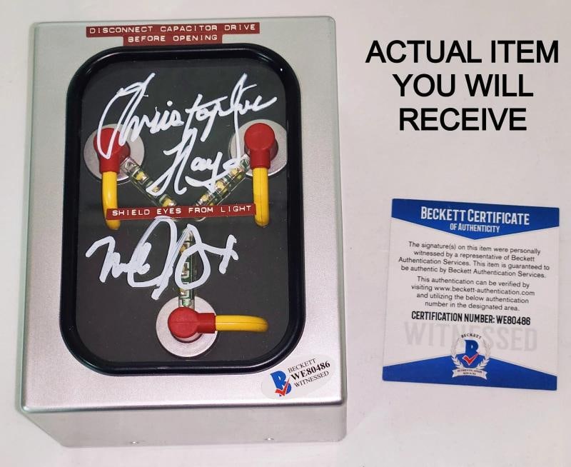Michael J Fox & Christopher Lloyd signed DeLorean Flux Capacitor Beckett PSA: Industry: Movies,Movie: Back To The Future,Signed by: Michael J Fox, Christopher Lloyd,Autograph Authentication: Beckett,Original/Reproduction: Original,Country of Origin: United States 