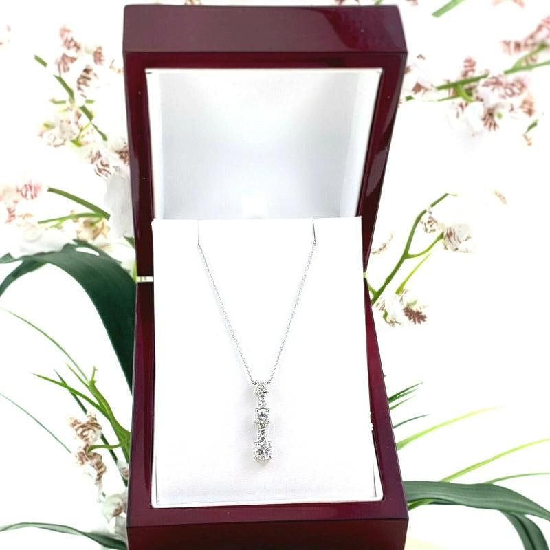 Round Diamond Past Present Future Pendant Necklace 18 kt White Gold: Condition: Pre-owned - Good,Main Stone Creation: Natural,Fancy Diamond Color: White,Length (inches): 21' with Pendant,Color: White,Main Stone Color: White/Colorless,Metal: White Gold,Total Carat