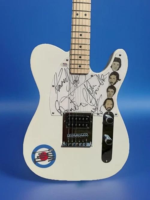 THE WHO: Roger Daltrey, Pete Townshend, John Entwistle, and Kenney Jones Signed Guitar (PSA LOA): Industry: Music,Signed: Yes,Autograph Authentication: Professional Sports (PSA/DNA),Original/Reproduction: Original,Country of Origin: United States