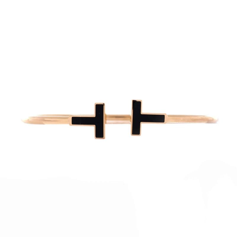 Tiffany & Co. T Wire Bracelet 18K Rose Gold with Onyx: Measurements: Circumference: 6.40 ", Width: 2.45 mm .Condition: Pre-owned - Good,Brand: Tiffany & Co.,Main Stone: Onyx,Metal: 18K Rose Gold,Metal Purity: 18K,Style: Bracelet,Type: Bracelet,Color: