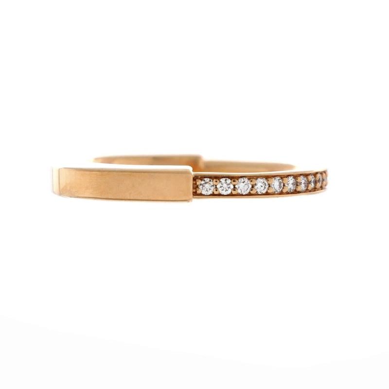 Tiffany & Co. Lock Ring 18K Rose Gold with Pave Diamonds: Measurements: Size: 5, Width: 3.00 mm . Condition: Pre-owned - Good,Brand: Tiffany & Co.,Main Stone: Diamond,Metal: 18K Rose Gold,Metal Purity: 18K,Ring Size: 5,Type: Ring,Color: Rose Gold,Material: