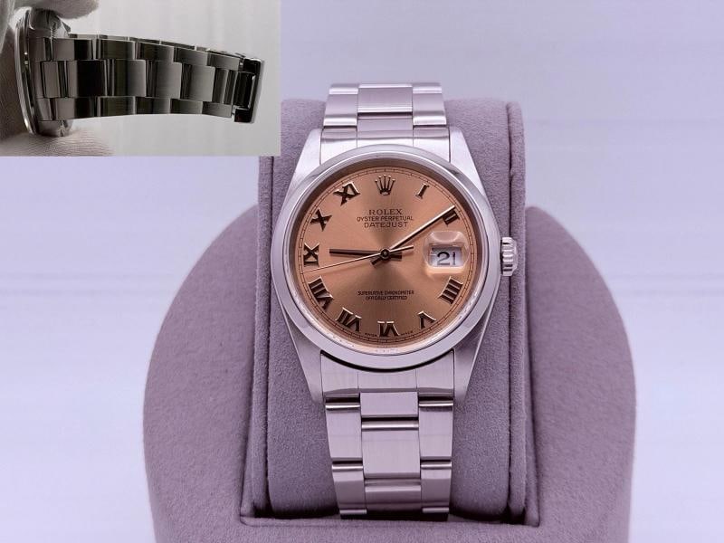 Rolex Datejust 16220 36mm Pink Roman Dial Stainless Steel: Condition: Pre-owned - Excellent,Bezel Color: Silver,Movement: Mechanical (Automatic),Indices: Roman Numerals,Year Manufactured: 2000-2009,Band/Strap: Rolex Oyster,Reference Number: 16220,Brand: