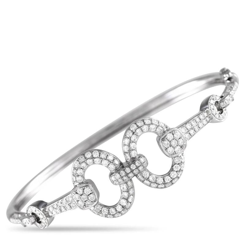 18K White Gold 1.85ct Diamond Bracelet: The classic horse bit is elevated thanks to sparkling inset diamonds with a total weight of 1.85 carats. Simple and elegant, it measures 7.0 long.. Condition: New with packaging: This item is brand