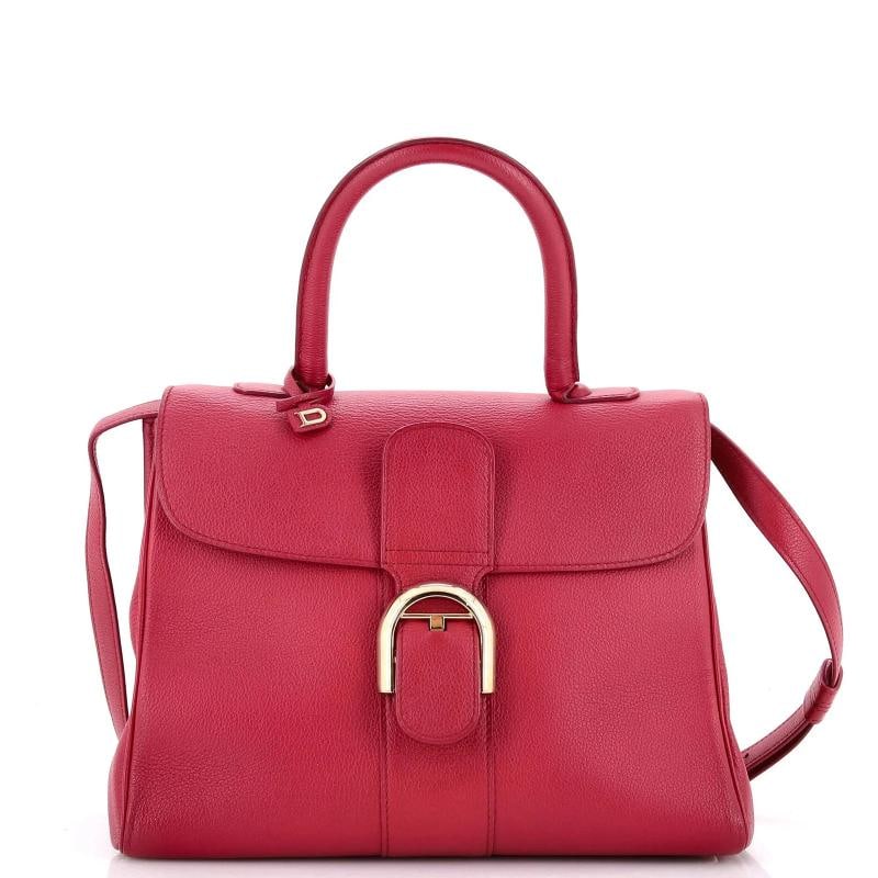 Delvaux Brillant Top Handle Bag Leather MM: Accessories: Charms, Mirror, With Strap Measurements: Handle Drop 4.5", Height 8.5", Width 11", Depth 6", Strap Drop 14.5-20". Condition: Pre-owned - Excellent,Brand: Delvaux,Exterior Material: