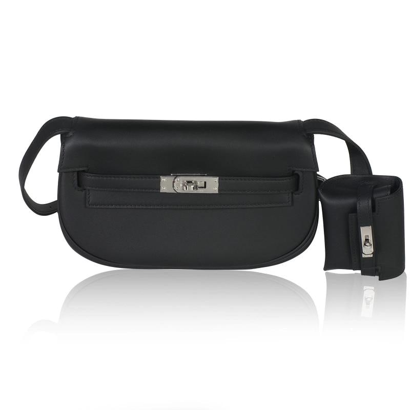 Hermƒ¨s Black Swift Kelly Moove PHW: Condition: Pre-owned - Good,Country of Origin: France,Dimensions: 7.5 x 4.5 x 2.5,Handbag Accessories: Box;Dustbag;Gift Ribbon;Care Booklet;Charm;Felt Protector,Bag Width: 7.5 in,Bag Depth: 2.5