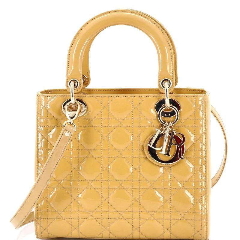 Christian Dior Lady Dior Bag Cannage Quilt Patent Medium: Condition: Pre-owned - Excellent,Brand: Christian Dior,Exterior Material: Patent Leather,Style: Top Handle,Exterior Color: Yellow,Department: Women,Size: Medium,Accessories: With Strap