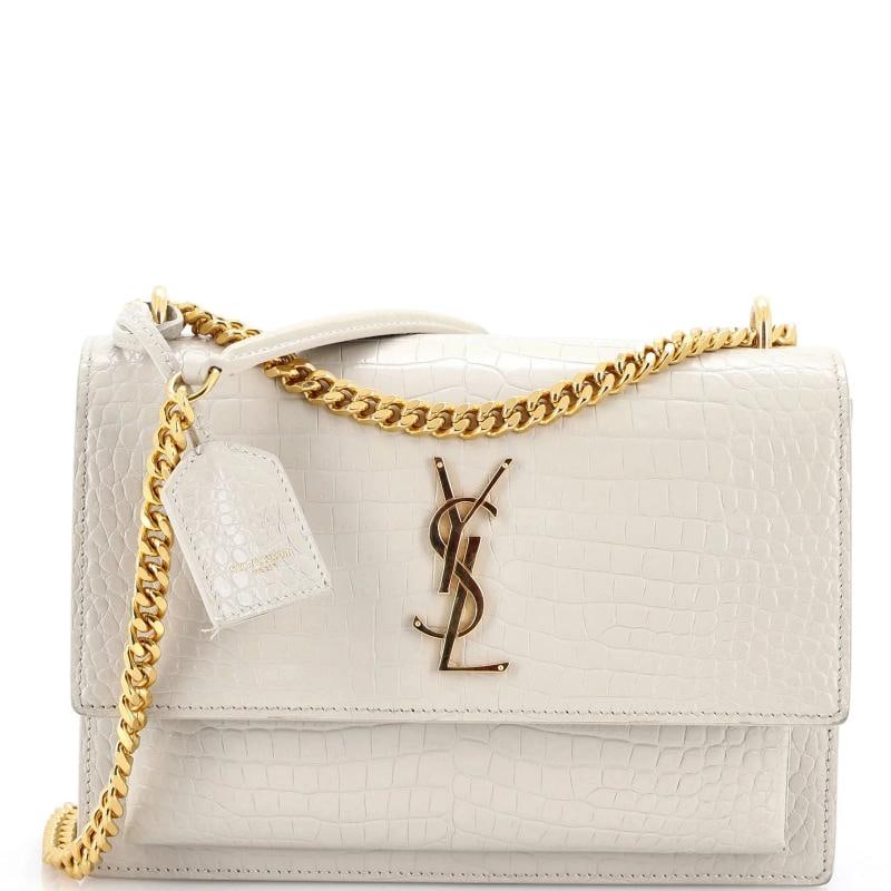 Saint Laurent Sunset Crossbody Bag Crocodile Embossed Leather Medium: Accessories: Clochette Measurements: Handle Drop 11.5", Height 6", Width 8.5", Depth 3", Strap Drop 12-20.5". Condition: Pre-owned - Good,Brand: Saint Laurent,Exterior Material: Leather,Style: Cross