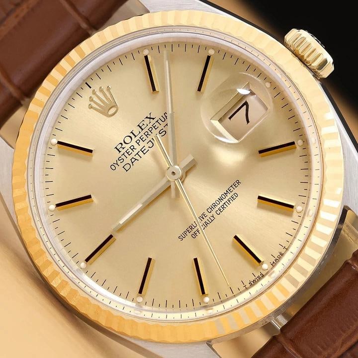 ROLEX MENS DATEJUST 16013 18K YELLOW GOLD STEEL CHAMPAGNE BROWN LEATHER WATCH: This is an authentic Rolex 16013 watch with Rolex stick dial, Rolex 18K yellow gold fluted bezel, and custom genuine brown leather strap. Descriptions: Brand: Rolex Model: Datejust Reference: 16013 Ge