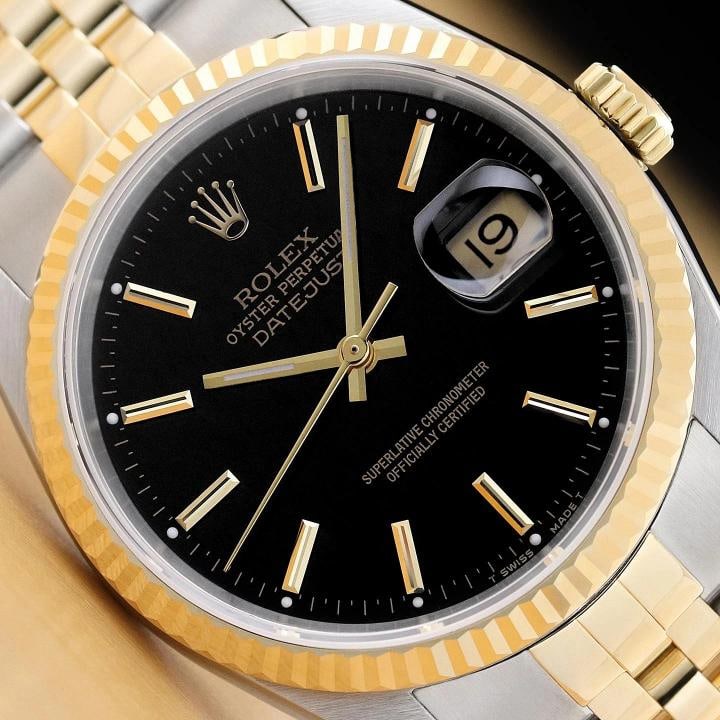 ROLEX MENS DATEJUST 16233 BLACK DIAL 18K GOLD STEEL TWO TONE WATCH w/ ROLEX BAND: This is an authentic Rolex Datejust 16233 watch with an original Rolex two tone 18K yellow gold and stainless steel jubilee bracelet, Rolex stick dial Ref., and Rolex 18K yellow gold fluted bezel.