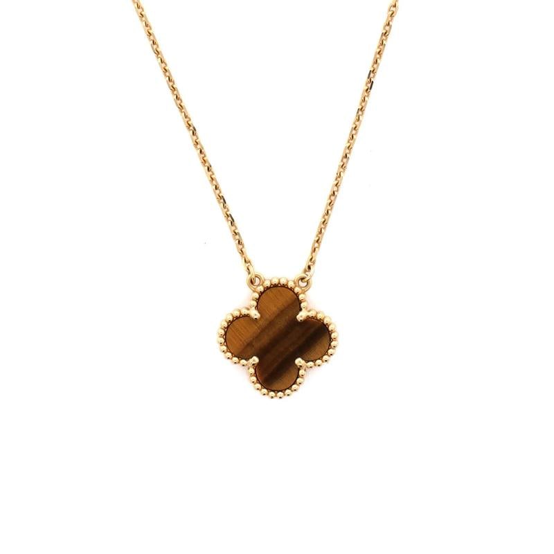Van Cleef & Arpels Vintage Alhambra Pendant Necklace 18K Yellow Gold and Tiger: Condition: Pre-owned - Good,Brand: Van Cleef & Arpels,Main Stone: Tiger'S-Eye,Metal: 18K Yellow Gold,Metal Purity: 18K,Style: Pendant,Type: Necklace,Color: Yellow Gold,Material: 18K Yellow Gold, Tiger