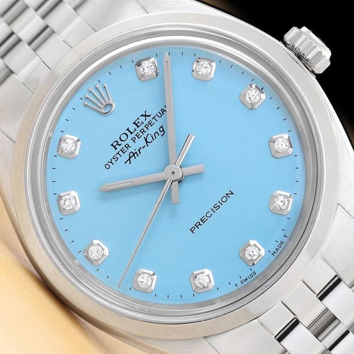 ROLEX OYSTER PERPETUAL AIR-KING 5500 STEEL AQUA BLUE DIAMOND DIAL 34MM WATCH: Condition: Pre-owned - Excellent,Bezel Color: Silver,Max Wrist Size: 7.26-7.5 in,Number of Jewels: 26 Jewels,Indices: Diamond Markers, 12-Hour Dial,Bezel: Rolex Stainless Steel Smooth