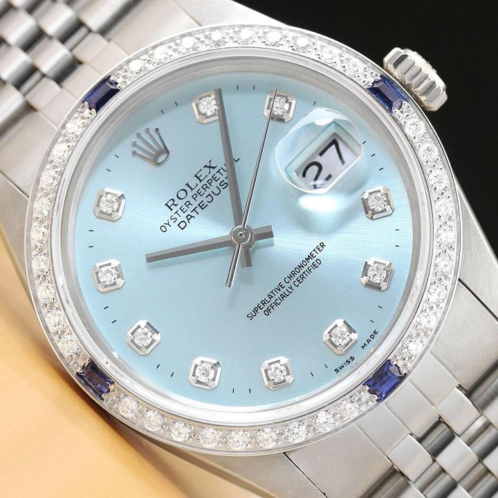 MENS ROLEX DATEJUST 16014 ICE BLUE DIAMOND 18K WHITE GOLD STEEL SAPPHIRE WATCH: Condition: Pre-owned - Excellent,Bezel Color: Silver,Max Wrist Size: 7.26-7.5 in,Number of Jewels: 27 Jewels,Indices: Diamond Markers, 12-Hour Dial, Multiple Hands,Bezel: Custom 18K White Gold Diamond